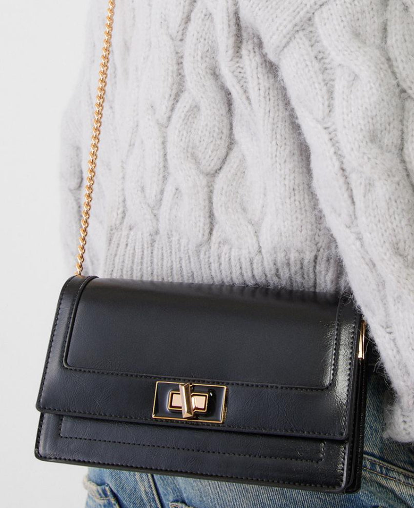 Crossbody bag with flap and painted closure